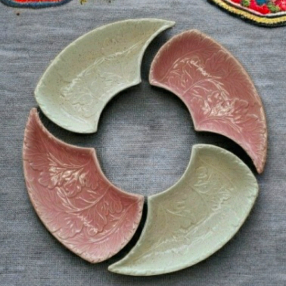 MCM California set of four dishes. Vintage  stackable pink and creme leaf design